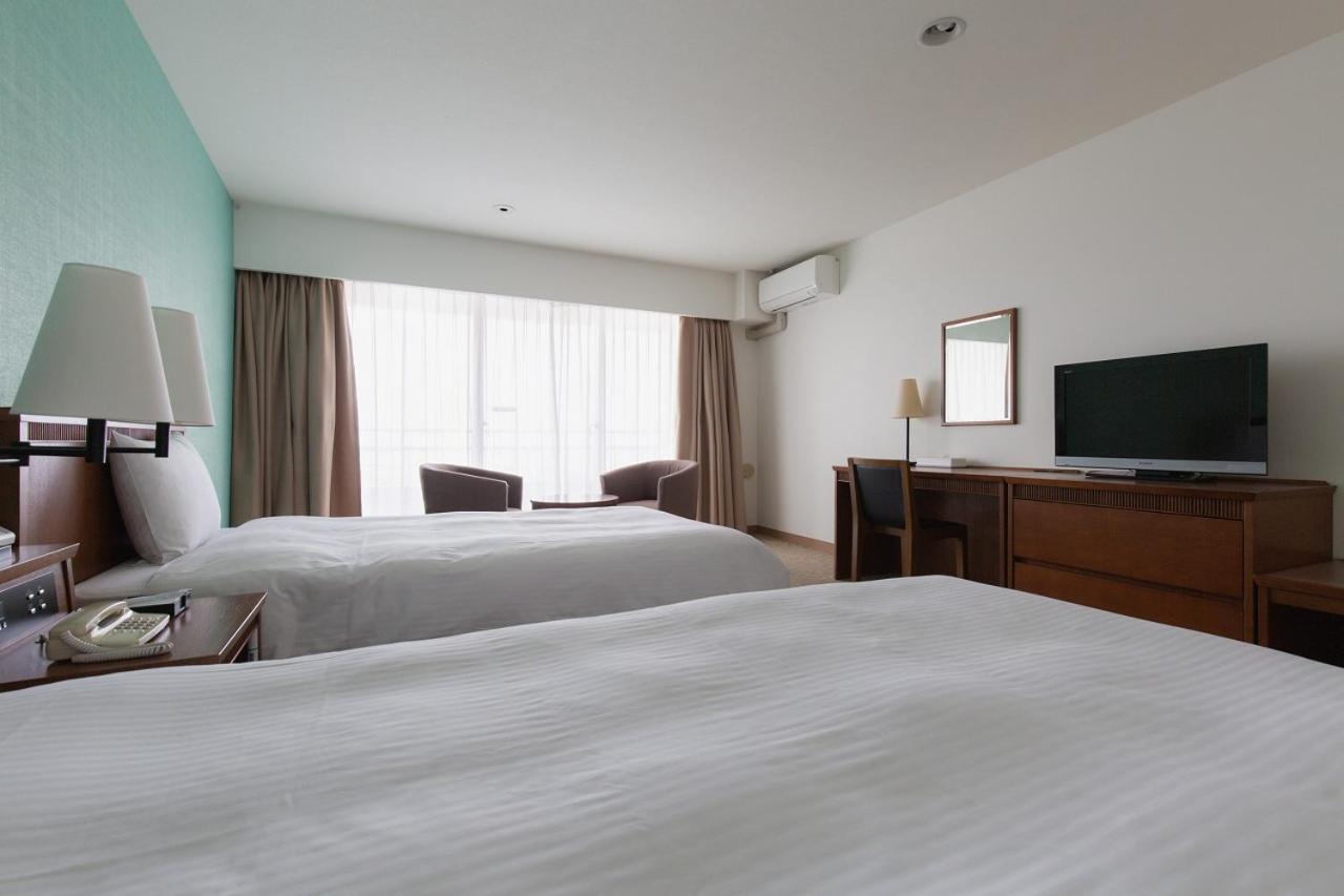 Em Wellness Kurashinohakko Lifestyle Resort Okinawa Rum bild